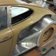 Trimming the rear bodywork down to fit the new fenders.
